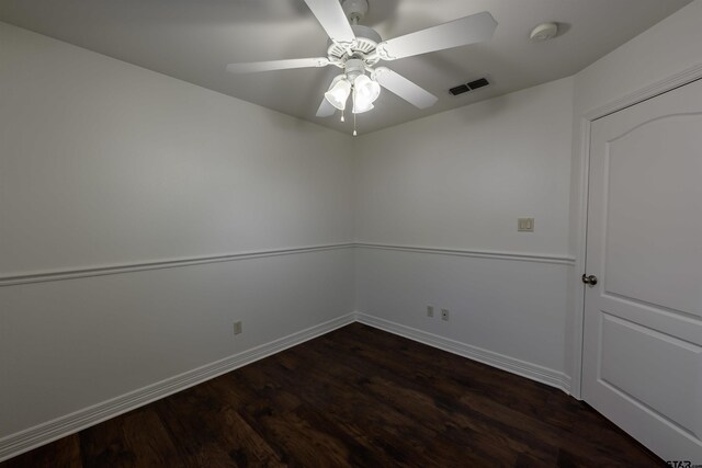 2056 Balsam Gap, Tyler, TX 75703 - empty room featuring baseboards, a ceiling fan, visible vents, and dark wood finished floors
