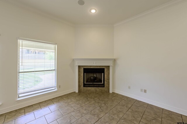 2056 Balsam Gap, Tyler, TX 75703 - unfurnished living room featuring baseboards, ornamental molding, and a fireplace