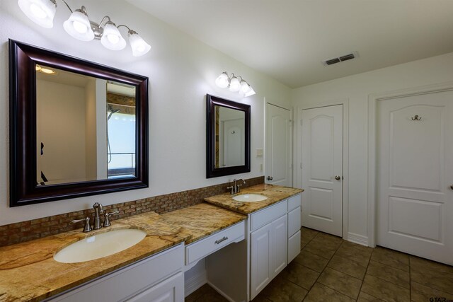2056 Balsam Gap, Tyler, TX 75703 - bathroom featuring tile patterned flooring, a sink, visible vents, and double vanity