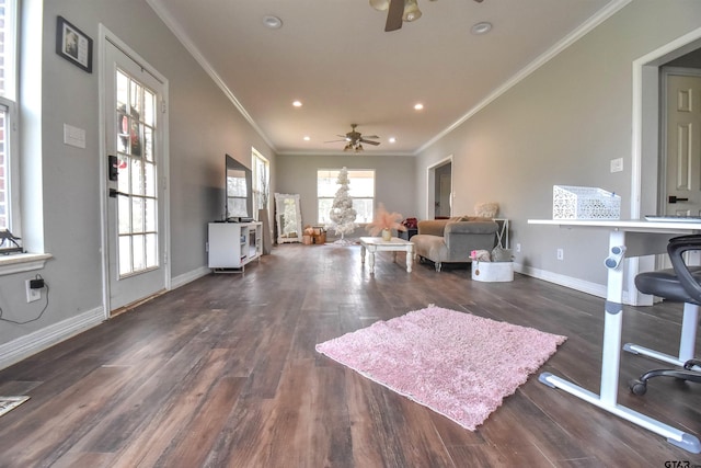 living room featuring dark hardwood / wood-style floors, ceiling fan, and ornamental molding