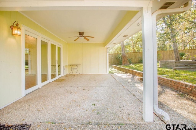 view of patio featuring ceiling fan and french doors