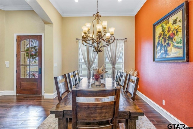 dining area featuring baseboards, a healthy amount of sunlight, dark wood finished floors, and ornamental molding