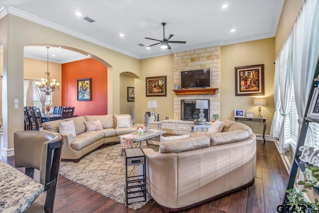 living room with visible vents, dark wood-style floors, and crown molding