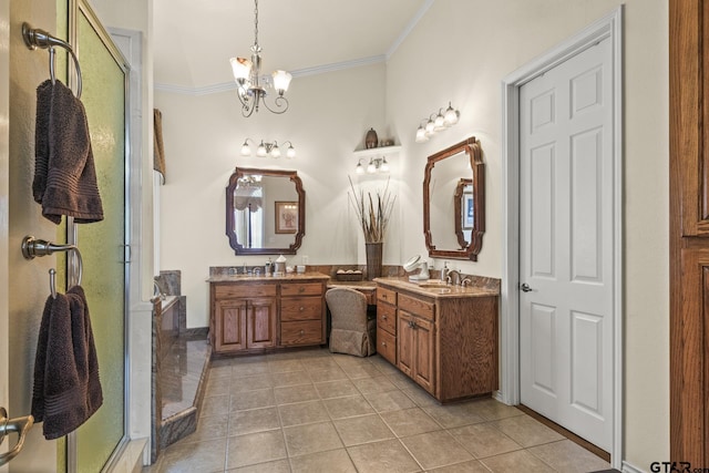 bathroom featuring tile patterned flooring, a shower with door, vanity, ornamental molding, and a notable chandelier