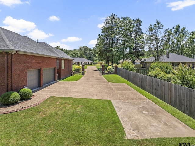 view of yard featuring a garage