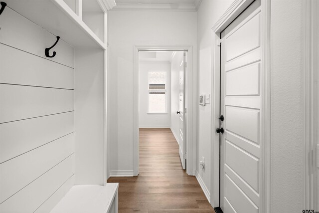 2716 Royal Village Way, Tyler, TX 75701 - mudroom featuring dark wood-style flooring, crown molding, and baseboards