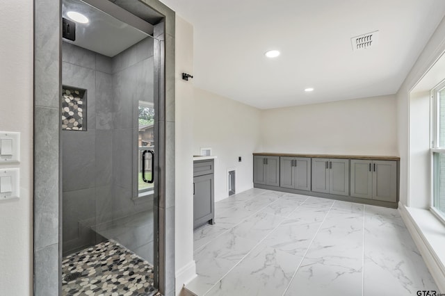 2918 Oak Knob Dr, Tyler, TX 75701 - bathroom with a shower stall, marble look tiles, recessed lighting, baseboards, and elevator