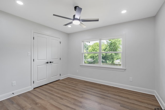 2918 Oak Knob Dr, Tyler, TX 75701 - unfurnished bedroom featuring baseboards, wood finished floors, recessed lighting, a closet, and a ceiling fan