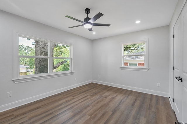 2918 Oak Knob Dr, Tyler, TX 75701 - unfurnished room featuring healthy amount of natural light, dark wood-type flooring, a ceiling fan, baseboards, and recessed lighting