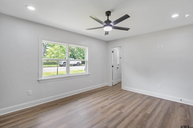 2918 Oak Knob Dr, Tyler, TX 75701 - empty room featuring a ceiling fan, baseboards, wood finished floors, and recessed lighting