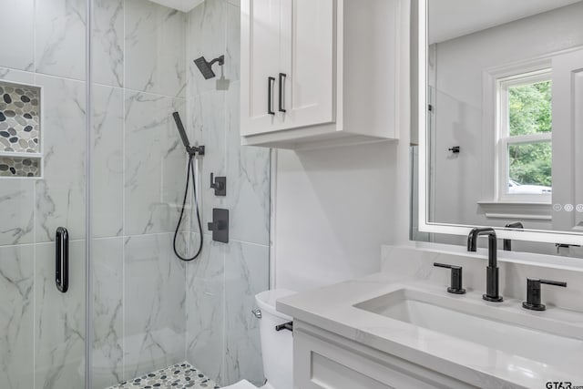 2918 Oak Knob Dr, Tyler, TX 75701 - full bath with a marble finish shower, vanity, and toilet