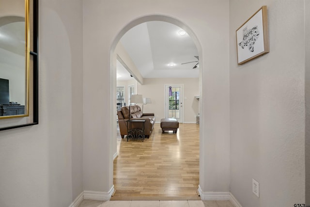 1039 Fm 2909, Canton, TX 75103 - hall featuring arched walkways, baseboards, and light wood-type flooring