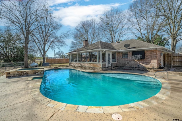 1039 Fm 2909, Canton, TX 75103 - view of pool featuring a sunroom, a fenced backyard, a jacuzzi, and a patio