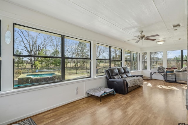 1039 Fm 2909, Canton, TX 75103 - sunroom with ceiling fan, healthy amount of natural light, and wood finished floors