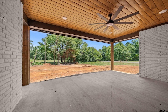 view of patio featuring ceiling fan