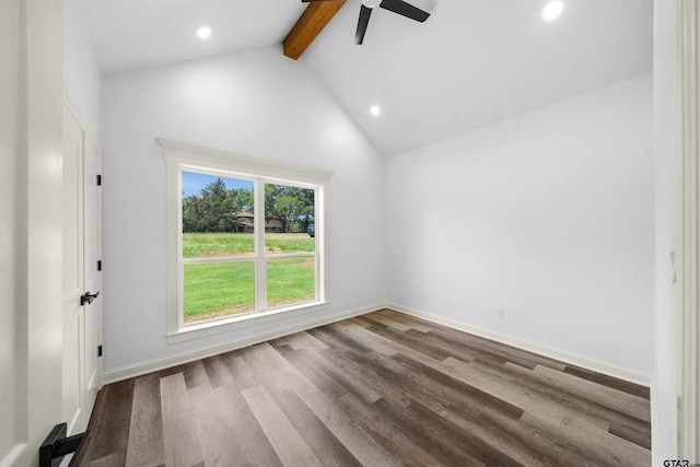 spare room with ceiling fan, a healthy amount of sunlight, beam ceiling, and hardwood / wood-style floors