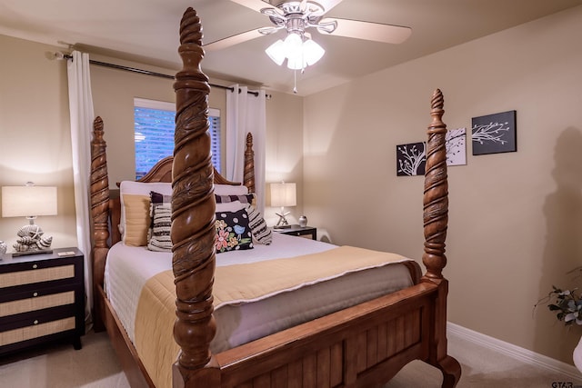bedroom featuring baseboards, ceiling fan, and carpet flooring