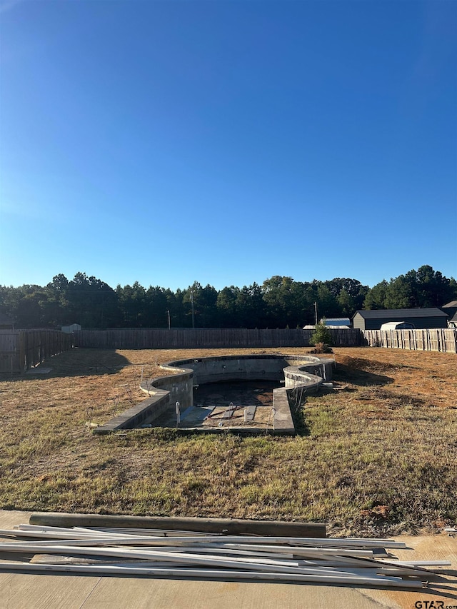 view of yard with a rural view