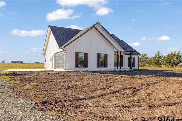 exterior space with a garage