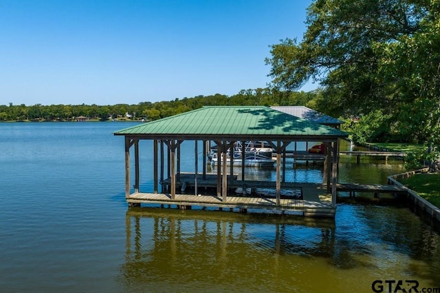 dock area featuring a water view