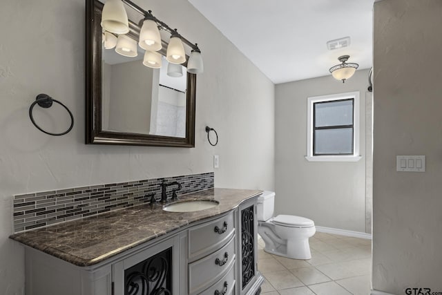 bathroom featuring backsplash, tile patterned floors, vanity, beverage cooler, and toilet