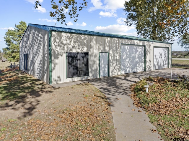 view of outdoor structure with a garage