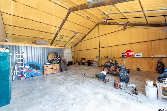 garage with wood walls