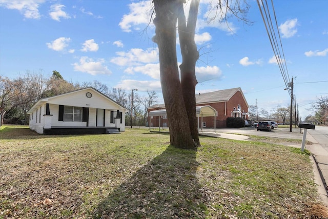 3019 N Grand Ave, Tyler, TX 75702 - view of side of property featuring a lawn and driveway