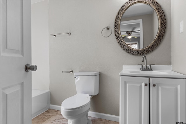 3019 N Grand Ave, Tyler, TX 75702 - full bathroom with a ceiling fan, toilet, vanity, a bathtub, and baseboards