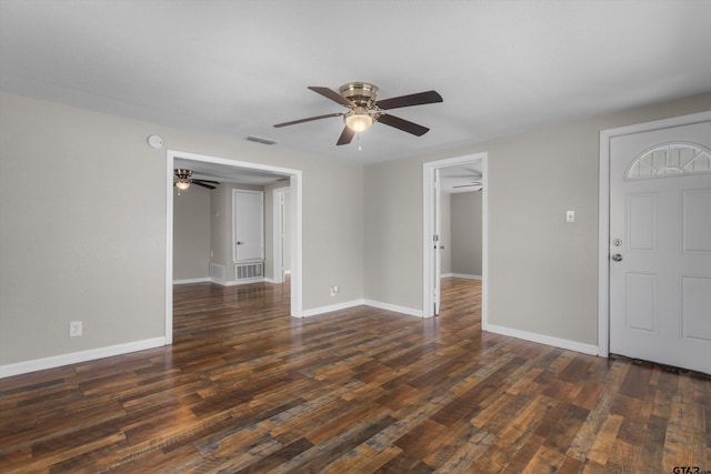 3019 N Grand Ave, Tyler, TX 75702 - spare room featuring ceiling fan, dark wood finished floors, and baseboards