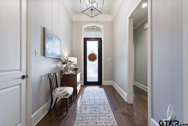 7417 Princedale, Tyler, TX 75703 - foyer entrance with a chandelier, ornamental molding, and dark wood-style flooring