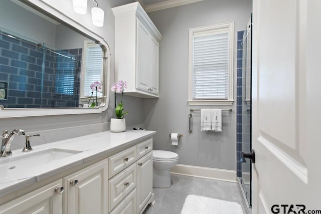 7417 Princedale, Tyler, TX 75703 - full bathroom with vanity, an enclosed shower, and ornamental molding