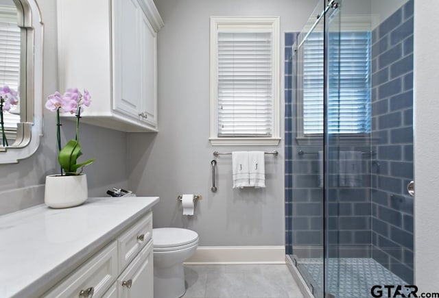 7417 Princedale, Tyler, TX 75703 - full bath featuring vanity, a stall shower, and tile patterned flooring