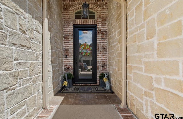 7417 Princedale, Tyler, TX 75703 - view of exterior entry featuring brick siding