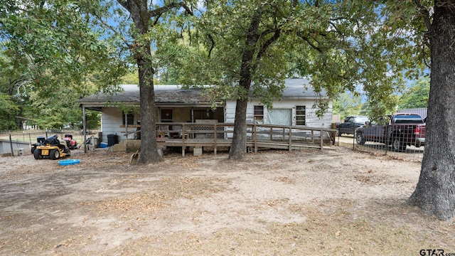 view of front of home with a deck