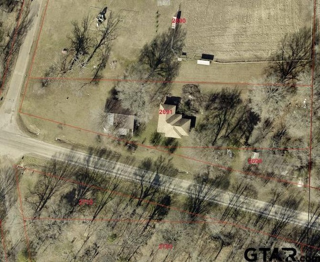 87 E Fm 71, Mount Pleasant, TX 75455 - aerial map of property and surrounding area with property boundaries highlighted