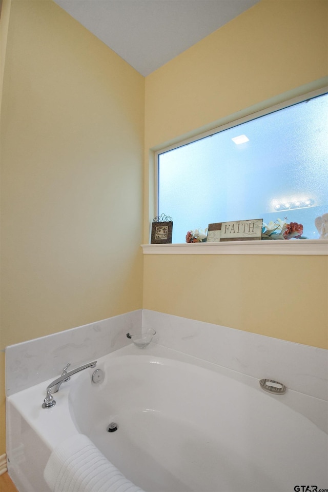 full bathroom featuring a garden tub