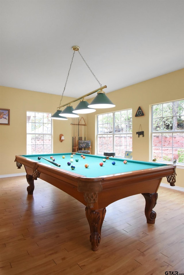 game room with billiards table and light wood-style floors