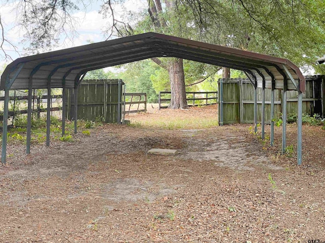 view of parking with a carport