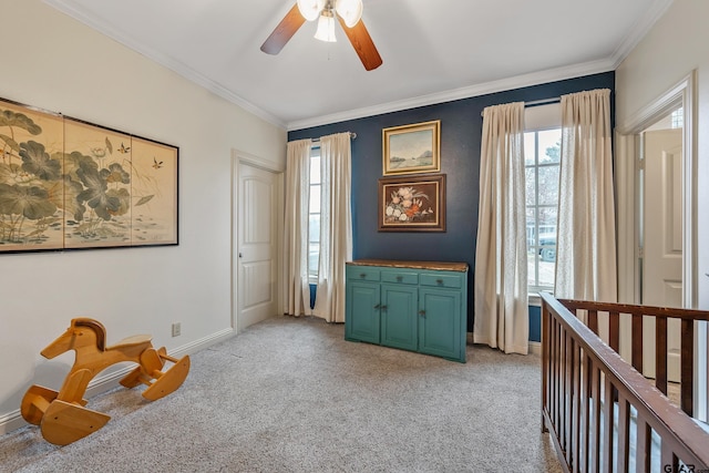 interior space with crown molding, light colored carpet, a healthy amount of sunlight, and ceiling fan