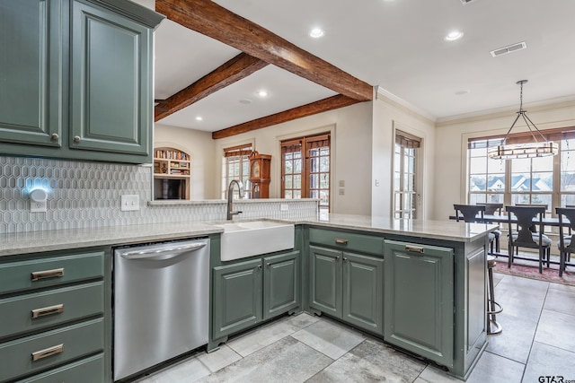 kitchen featuring stainless steel dishwasher, green cabinets, kitchen peninsula, and sink