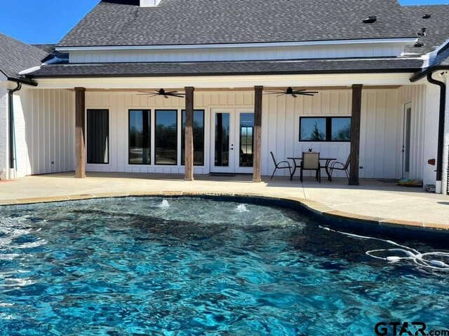 21830 County Mdws, Bullard, TX 75757 - back of property featuring a patio area, french doors, a ceiling fan, roof with shingles, and board and batten siding