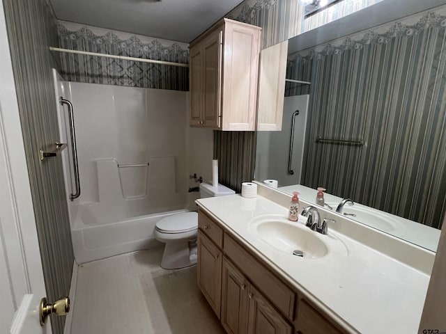 full bathroom featuring toilet, shower / bathtub combination, and vanity