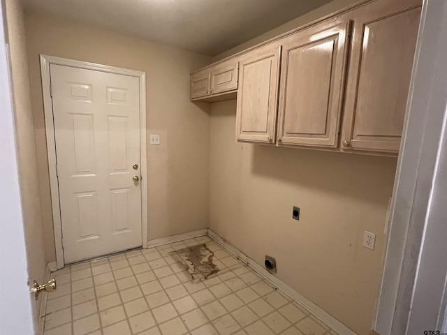 washroom featuring cabinets and hookup for an electric dryer