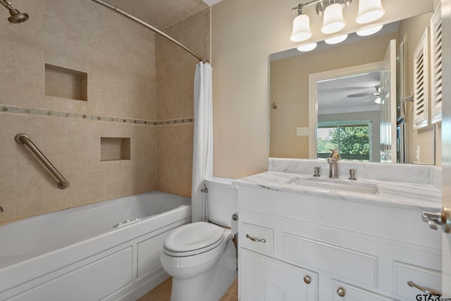 full bathroom featuring ceiling fan, shower / bath combo with shower curtain, vanity, tile patterned floors, and toilet