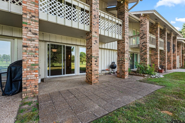 view of patio / terrace featuring a balcony and grilling area