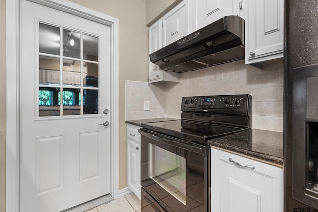 kitchen with black appliances, tasteful backsplash, and white cabinets