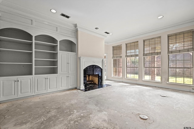 unfurnished living room with crown molding and a high end fireplace