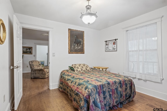 bedroom featuring hardwood / wood-style floors