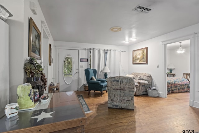 living area with wood-type flooring